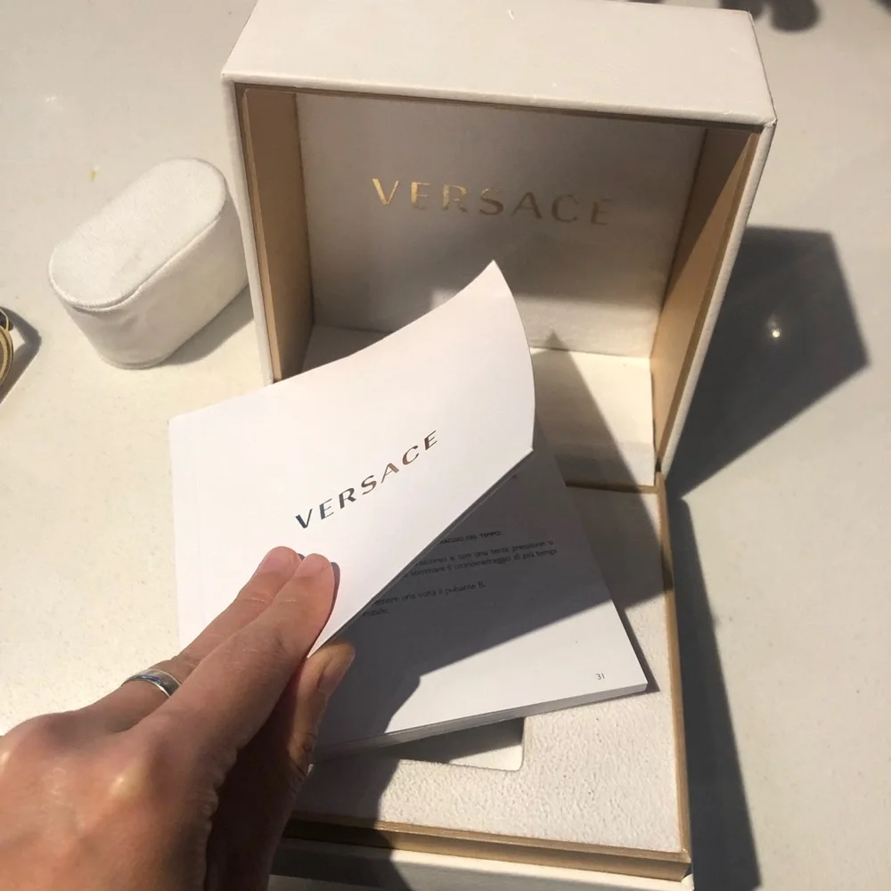 Versace White Dial Watch with Gold Bezel and Brown Strap